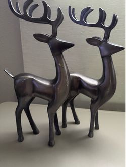 set of cast metal reindeer figurines both for $10