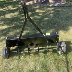 OBT-42 In  TOW- BEHIND  LAWN AERATION IN PERFECT CONDITION 