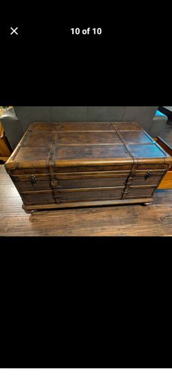 Crocodile embossed leather trunk coffee table with wicker panels"