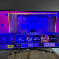 Samsung Tv With Remote With A Very Thin Line