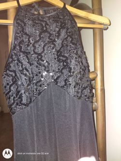 Full length sleeveless black gown, sequin bodice. Very pretty in real life!