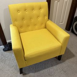 Yellow fabric tufted arm chair