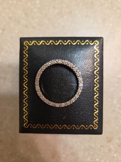 10 k White Gold Diamond Pendant.  Weight is 2.3 grams