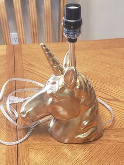 Gold unicorn lamp 
