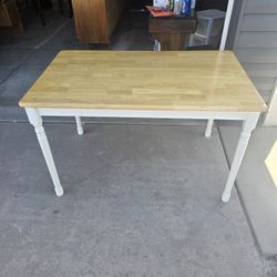 Solid Wood Farmhouse‑Style Table – $60
