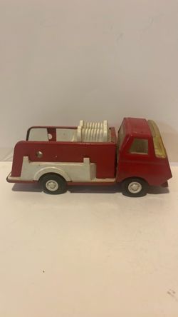 vintage 1970s Tonka fire pumper truck (such as the Tiny-Tonka Pumper No. 595 or No. 011824AST-D model)