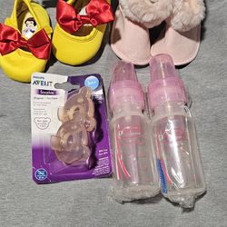 Baby Girl Shoes And Bottles