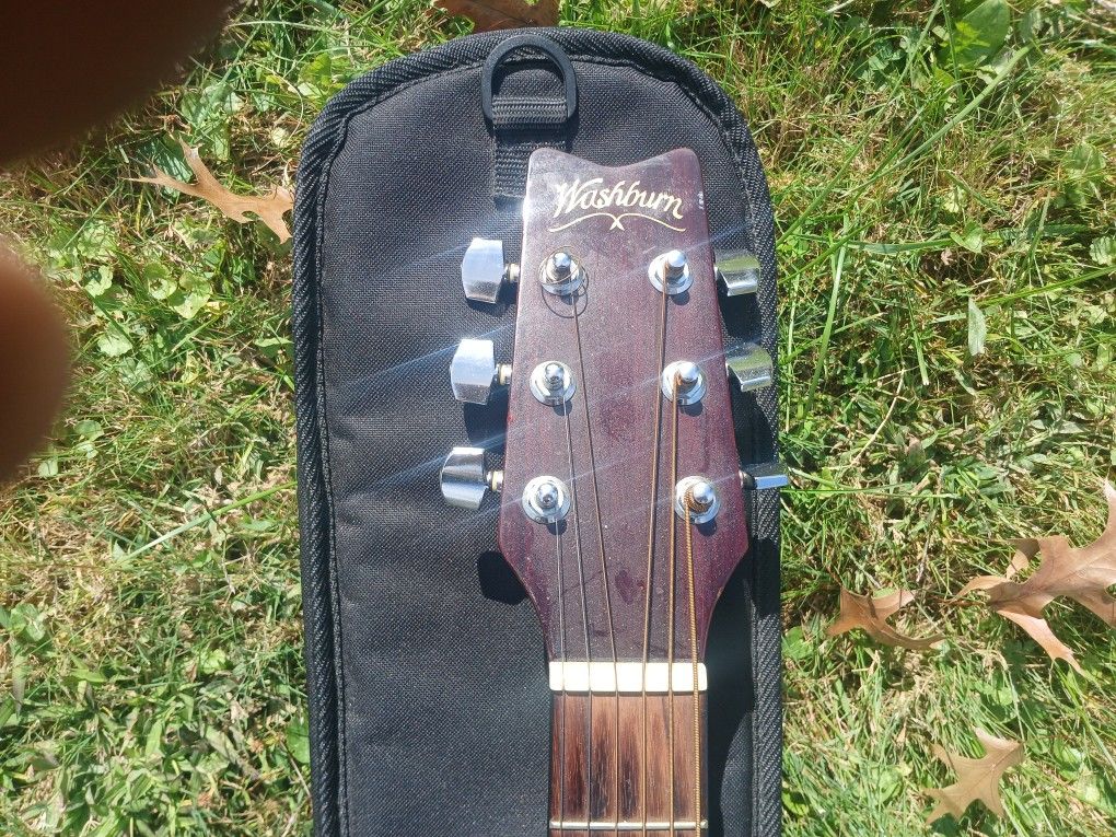 Washburn Left Handed Acoustic Guitar.