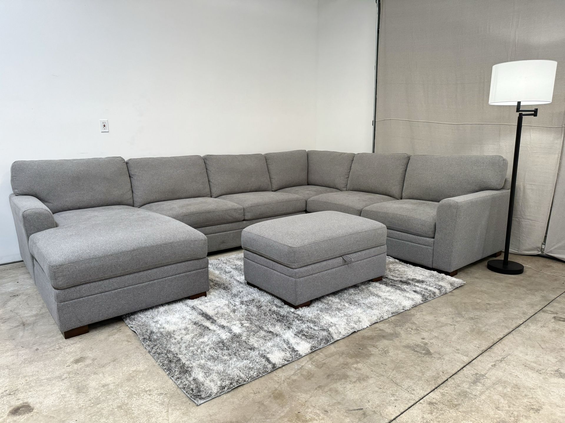 Fabric Sectional With Storage Ottoman