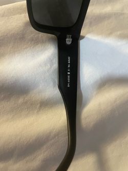 Luis Vitton sunglasses.