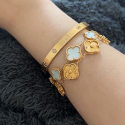 gold cartier love bracelet w 4 diamonds