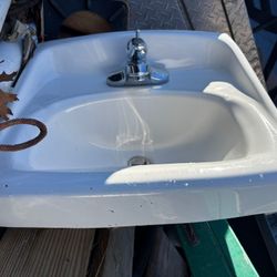 Two Sinks With Spigots. 
