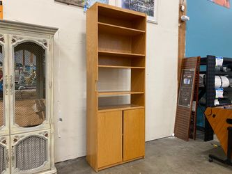 Tall Light Wood Bookcase with Bottom Cabinet