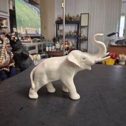 White Glazed Ceramic Elephant Figurine With Tusks Intact & Trunk Up 6"H X 7.5"L