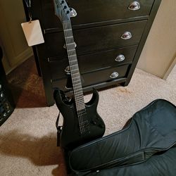 Ibanez electric guitar with stand