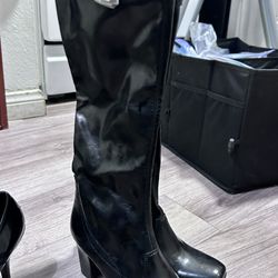 Burgundy & Black pair Of knee-high Franco Sarto heeled Boots