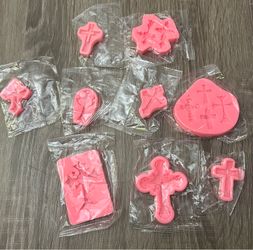 Cross shaped silicone molds.