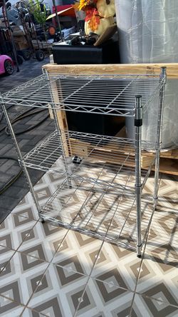 3 tier shelving racket