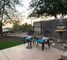 2 Patio chairs with lumbar back pillows