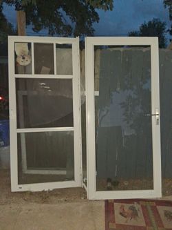 Two 36inch storm door one