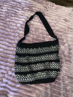 Handmade bag with can lids