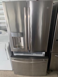 GE Stainless Steel Refrigerator And Freezer