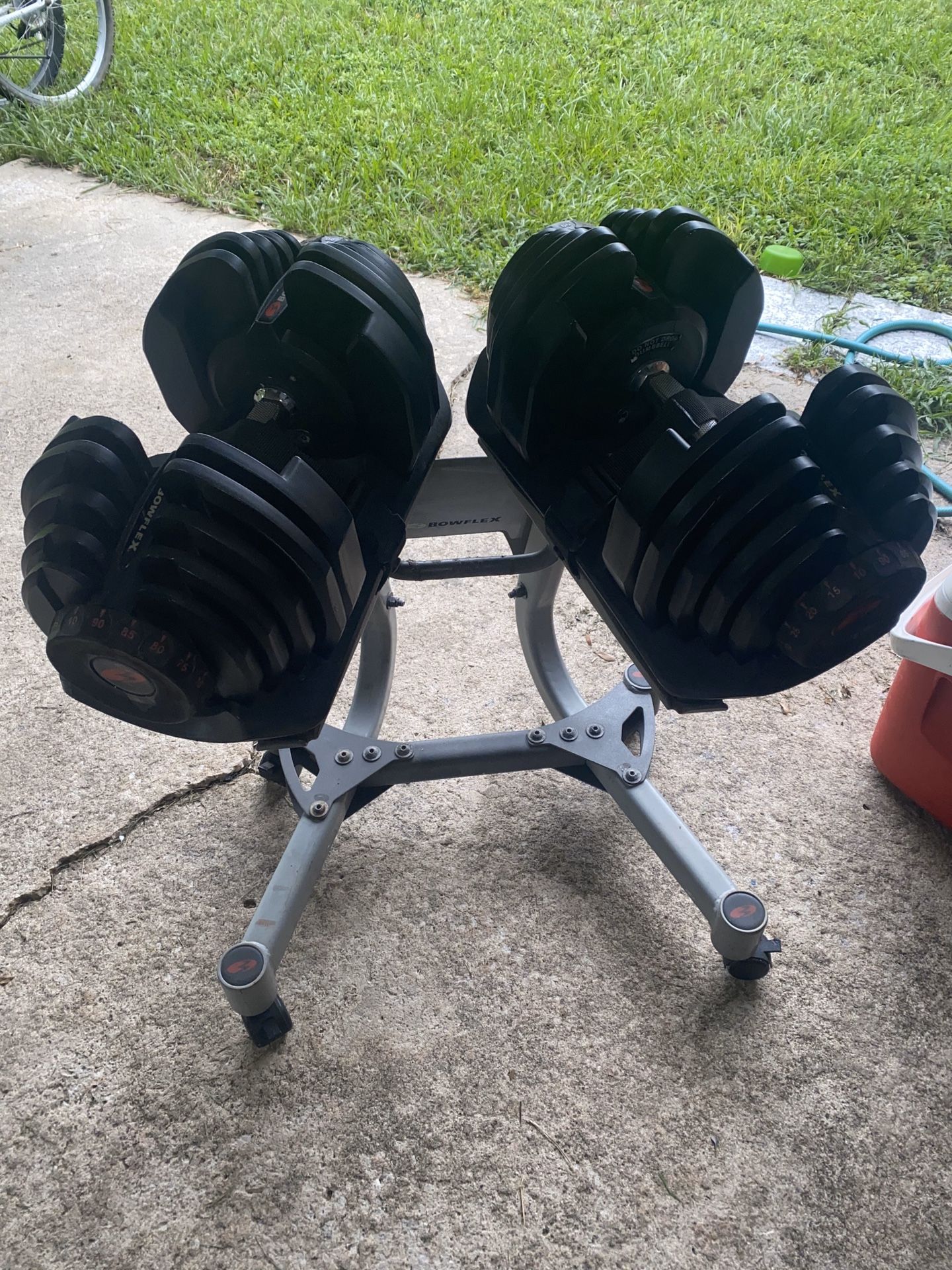 Bowflex 1090 dumbbells with weight stand for Sale in Orlando,