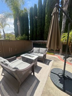 Complete Outdoor Patio Set – Loveseats, Fire Pit, Cantilever Umbrella & Rug