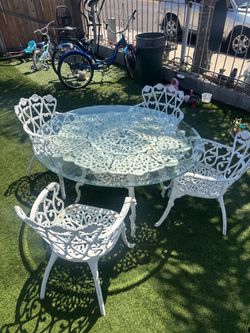 White Cast Iron Patio Table and Chair Set