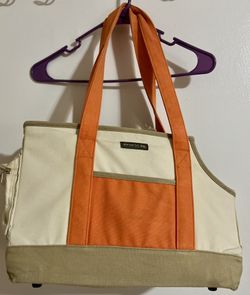 New York dog orange and cream colored dog carrier cold orange small/med 