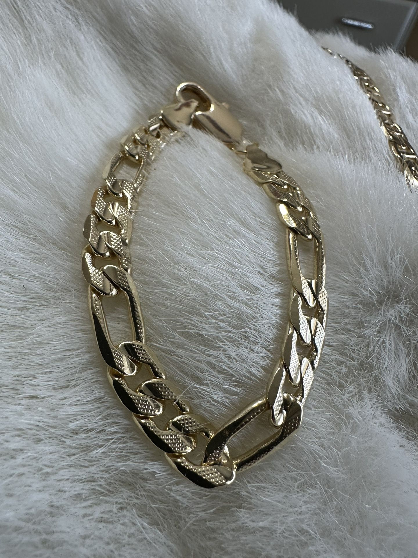 Bracelets.  Gold Plated $40. 14k. 