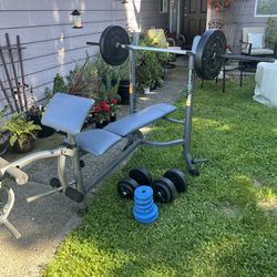 Bench With 110lbs Of Weights 