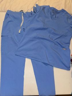 Light blue Fig scrubs both top and bottoms. Both XS