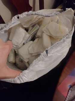Bag of diapers mainly size 1 some nb