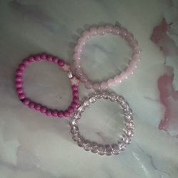 3 pink Bracelets