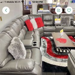 BEAUTIFUL GRAY OR BLACK SECTIONAL WITH 3 RECLINERS. SAME DAY DELIVERY AND EASY FINANCING.