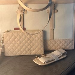 BRAND NEW Cream Colored Essentials Bag. 