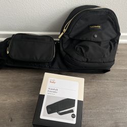 little black table holds books/ magazines 