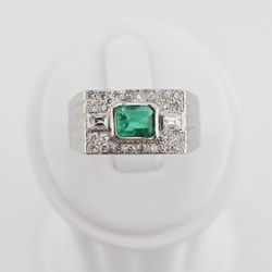 Men's platinum emerald and diamond ring