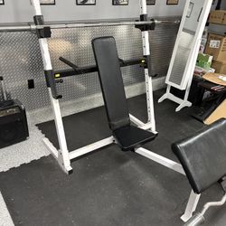 Bench With 45LB Bench Barbell And 15 LB Curl bar 