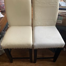 Free bar height chairs, need reupholstering.