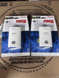 Plug in carbon monoxide detectors with backup battery, store price is ~63