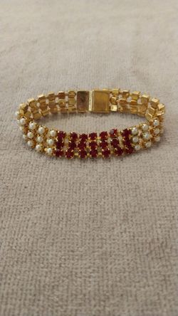 Vintage costume  3 row faux pearl and ruby red rhinestone bracelet