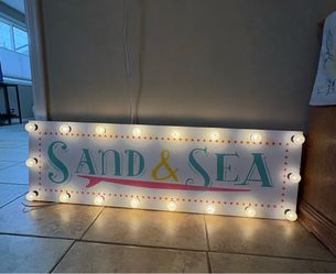 adorable light-up “Sand & Sea” marquee sign from Pottery Barn