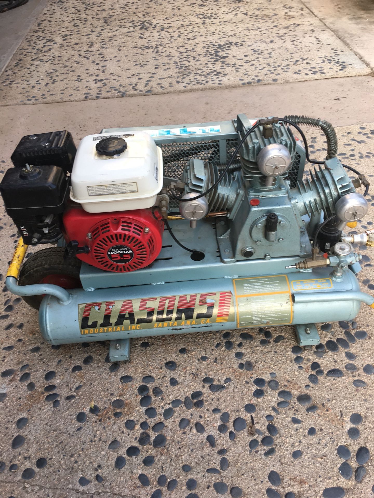 Ciasons Air compressor 18 CFM w/Honda motor. Three head cast iron compressor