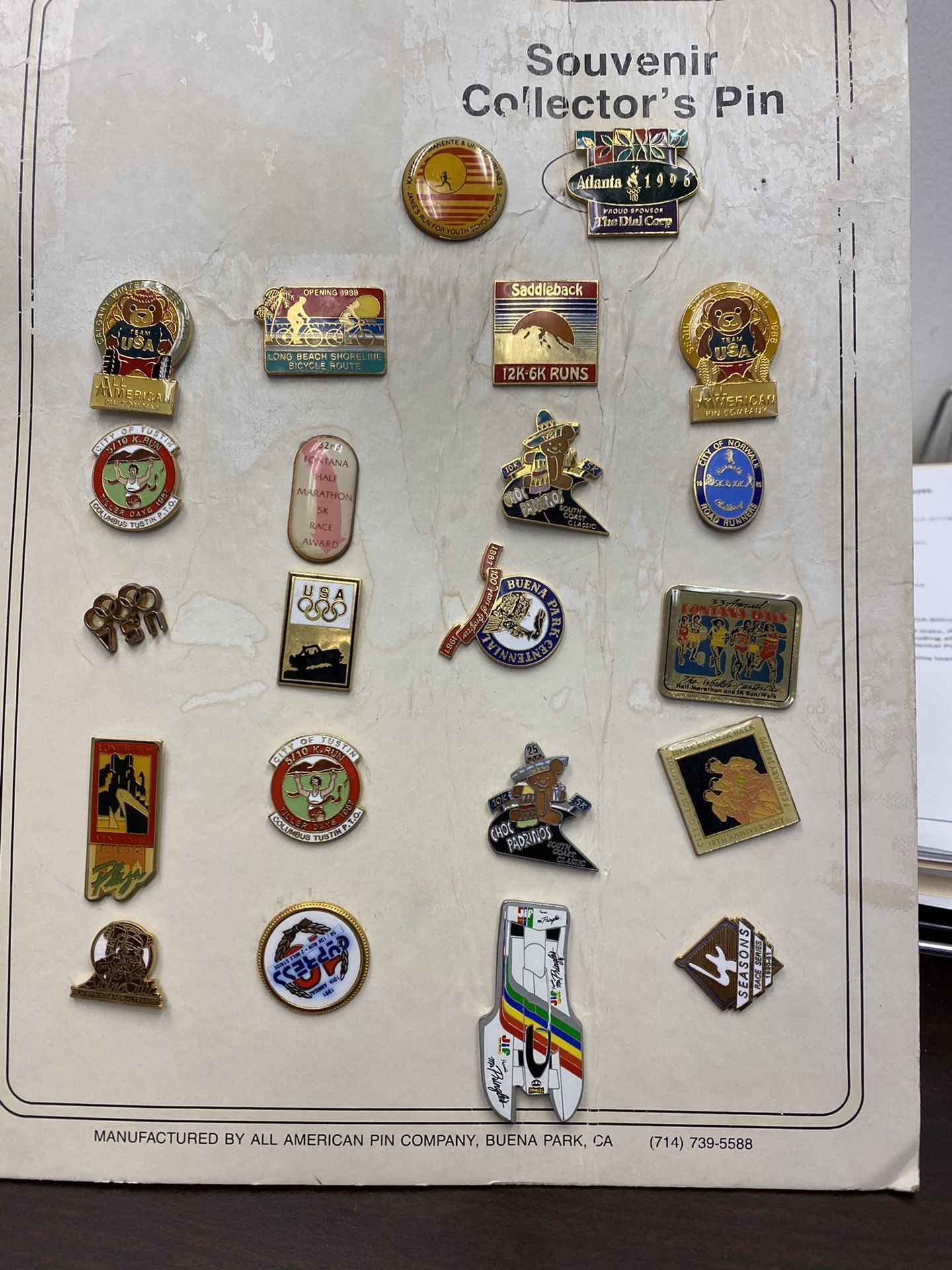 Misc Souvenir Pins on board display
