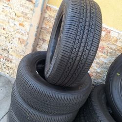245/65/17/ TOYO $300 SEMI NEW FOUR TIRES