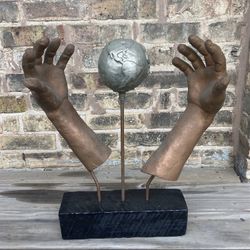 “World In His Hands” Metallic Statue