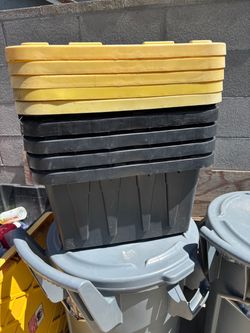 5 used 12 gallon black and yellow totes