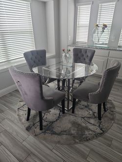 Table with 4 Chairs and rug